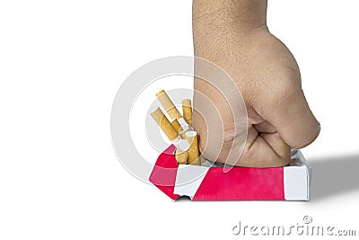 Man fist crushing cigarettes Stock Photo