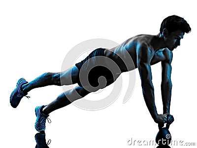 Man fitness Kettle Bell exercise shadow isolated white background silhouette Stock Photo