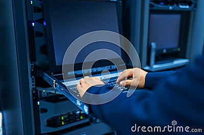 Man fix server network in data center room Stock Photo