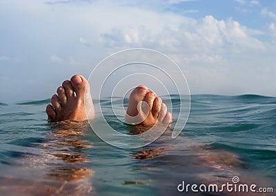 Man floating on the beach in vacations Stock Photo