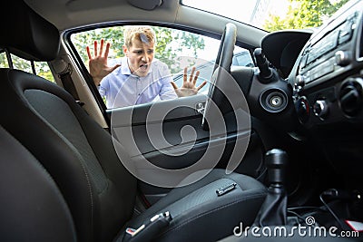 Man Forgot His Key Inside Car Stock Photo