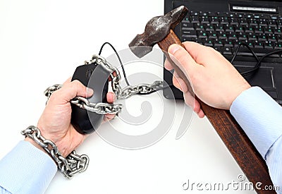 Man freed from the chain riveted to his computer and the virtual world. Stock Photo