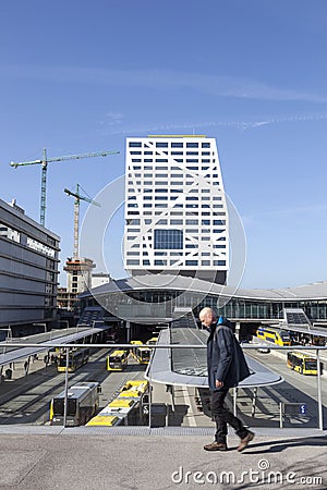 Man in front of new bus station and city office utrecht seen fro Editorial Stock Photo