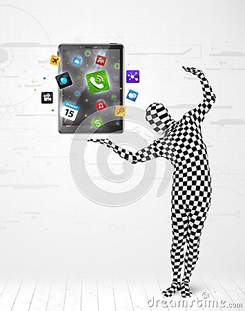 Man in full body suit holdig tablet pc Stock Photo