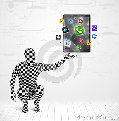 Man in full body suit holdig tablet pc Stock Photo