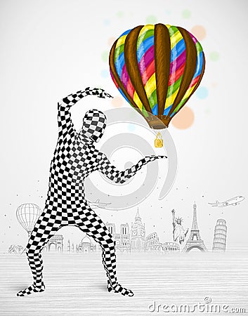 Man in full body suit holding balloon Stock Photo