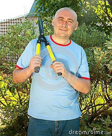 Man with garden pruner Stock Photo