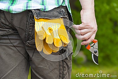 Man with gardening shears Stock Photo