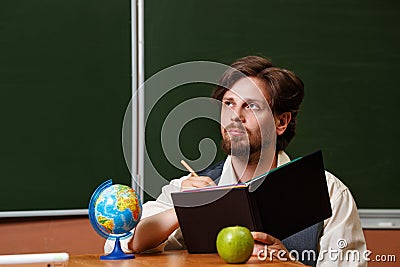 Man. Geography teacher. Stock Photo