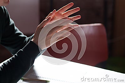 man gesturing hands at business meeting Stock Photo