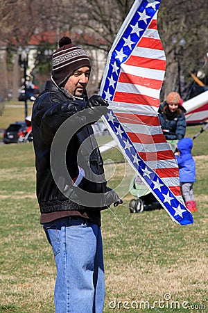 Man getting ready to fly his kite over the city,National Mall,Washington,DC,2015 Editorial Stock Photo