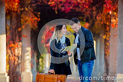 Man and girl help with navigation in the city for a tourist Stock Photo