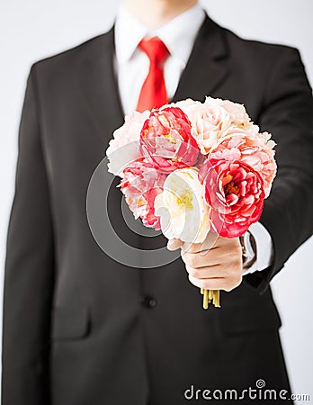 Man giving bouquet of flowers Stock Photo