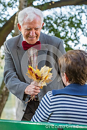 Man giving his wife bunch Stock Photo