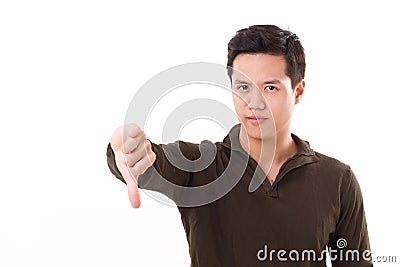 Man giving thumb down, rejection gesture Stock Photo