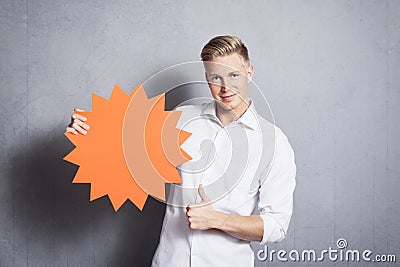Man giving thumbs up at empty sign. Stock Photo