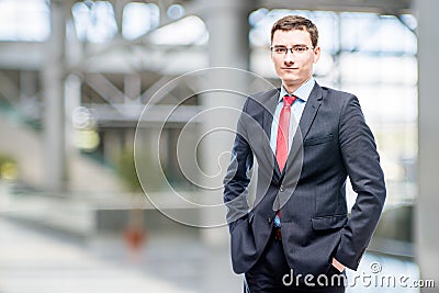 Man in glasses and business suit 25 years of age Stock Photo