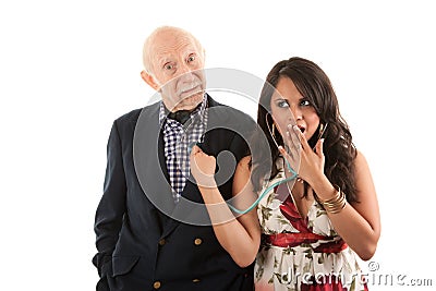 Man with gold-digger companion or wife Stock Photo