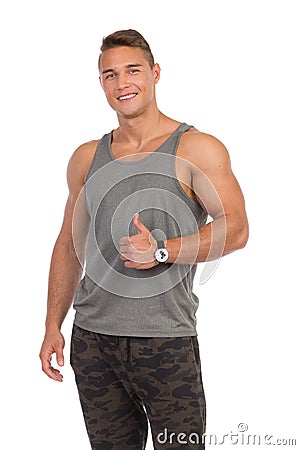 Man In Gray Tank Top Giving Thumb Up Stock Photo