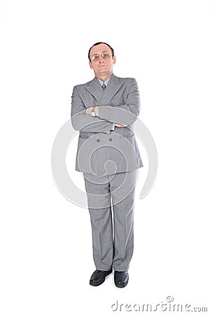 Man in grey suit stands Stock Photo