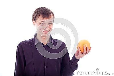 Man grimace holding sour fruit Stock Photo