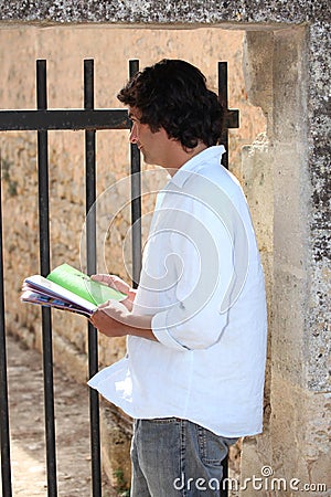 Man with a guidebook Stock Photo