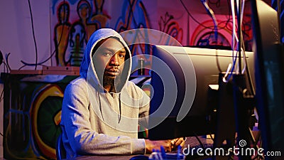 Man hacking systems, stealing data Stock Photo