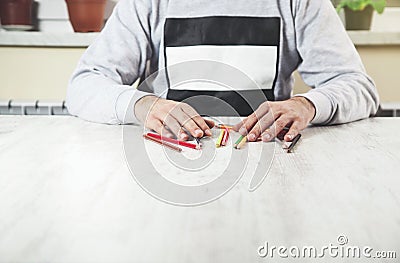 Man hand color pencils Stock Photo