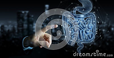 Man hand using digital x-ray of human intestine holographic scan projection 3D rendering Stock Photo