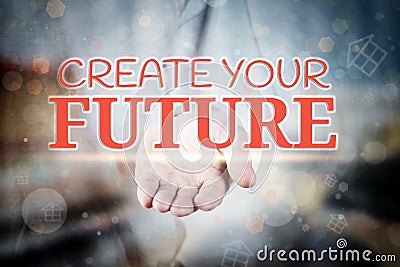 Man hand holding Create Your Future text on blurry home icon pro Stock Photo