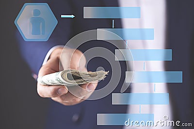 Man hand holding money with virtual screen Stock Photo