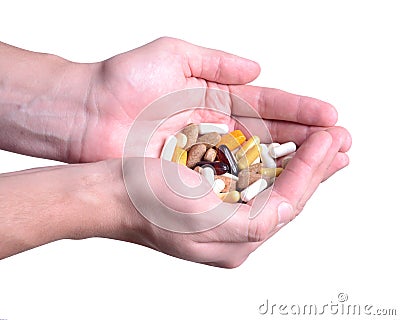 Man hand holding pills Stock Photo