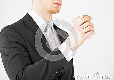 Man hand holding take away coffee Stock Photo