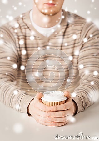 Man hand holding take away coffee cup Stock Photo