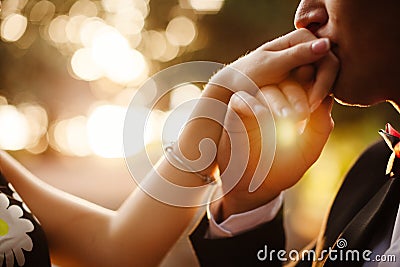 Man hand kissing woman. Stock Photo