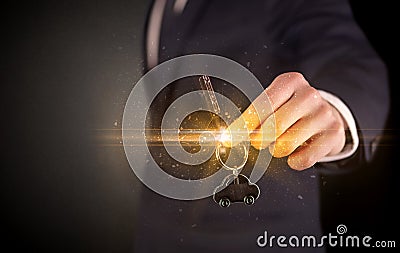 Man hand over keys Stock Photo