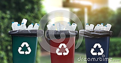 man hand putting plastic reuse for recycling concept environmen Stock Photo