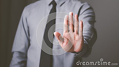 man hand stop sign, warning concept, refusal, caution, symbolic communication Stock Photo