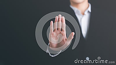 man hand stop sign, warning concept, refusal, caution, symbolic communication, preventing subsequent problems Stock Photo