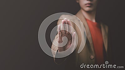 man hand stop sign, warning concept, refusal, caution, symbolic communication, preventing subsequent problems,Help Prevent Piracy Stock Photo