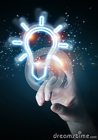 Man hand using lightbulb neon digital interface 3D rendering Stock Photo