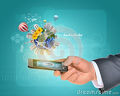 Man hand using smartphone. Earth with buildings Stock Photo