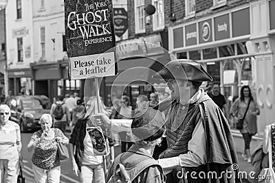 Man Handing Out Ghost Walk Experience Leaflets in York City Centre. Editorial Stock Photo