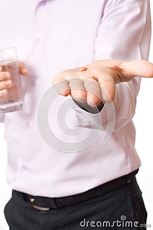 Man handing pill Stock Photo