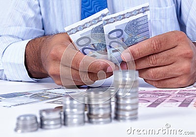 Man handling money Stock Photo