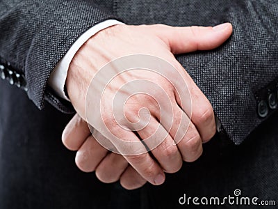 Man hands gesture protection defence insecurity Stock Photo