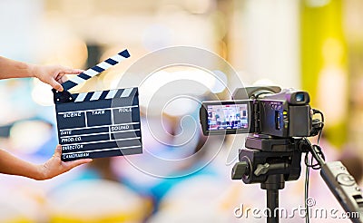 Man hands holding movie clapper.Film director concept.camera show viewfinder image catch motion in interview or broadcast wedding Stock Photo