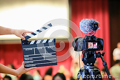 Man hands holding movie clapper.Film director concept.camera show viewfinder image catch motion in interview or broadcast wedding Stock Photo