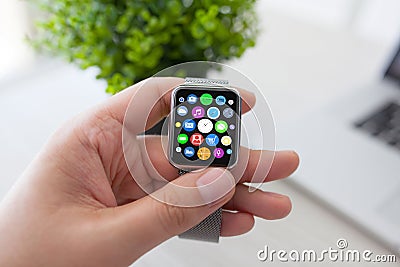 Man hands smart touch watch with home screen icons apps Stock Photo