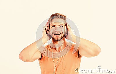 Man handsome bearded guy listening music headphones white background. Audiovisual spectacular. Melody put over various Stock Photo